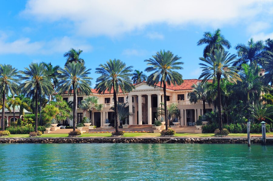Is fumigation safe for pets - Luxury waterfront mansion surrounded by palm trees