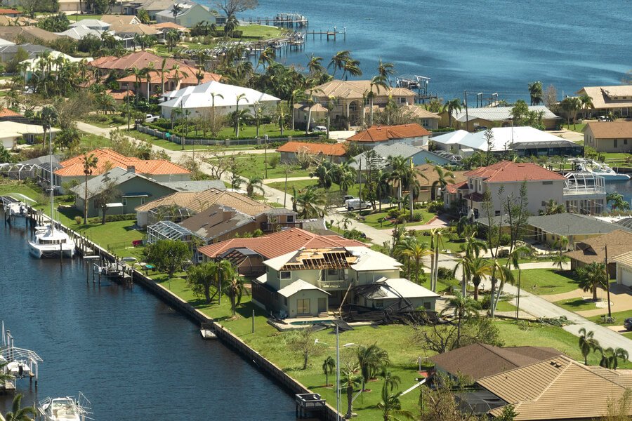 Pest control for ants and termites - Aerial view of waterfront neighborhood with houses.